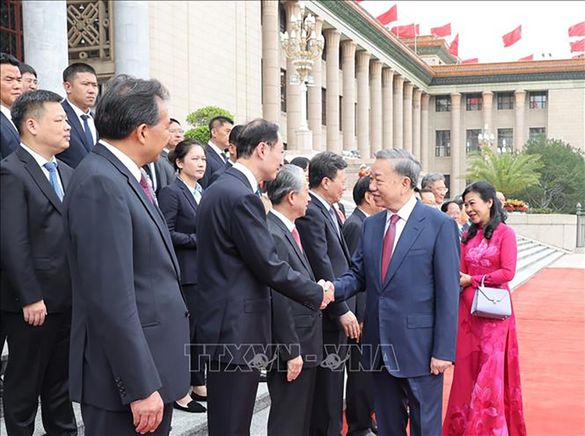 vna_potal_le_don_tong_bi_thu_chu_tich_nuoc_to_lam_va_phu_nhan_tham_cap_nha_nuoc_toi_trung_quoc_stand-2-.jpg