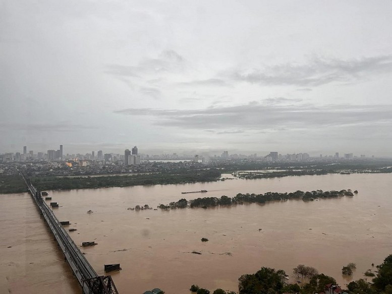 Thủ tướng chỉ đạo tập trung ứng phó lũ lớn, đảm bảo an toàn đê điều- Ảnh 1.