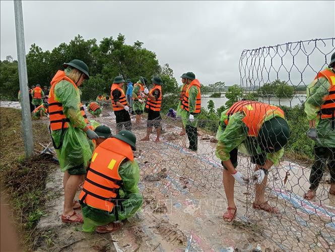 can-bo-chien-si-trung-doan-102-su-doan-308-gia-co-de-song-tich-thuoc-dia-ban-huyen-quoc-oai.-anh-ttxvn.jpg