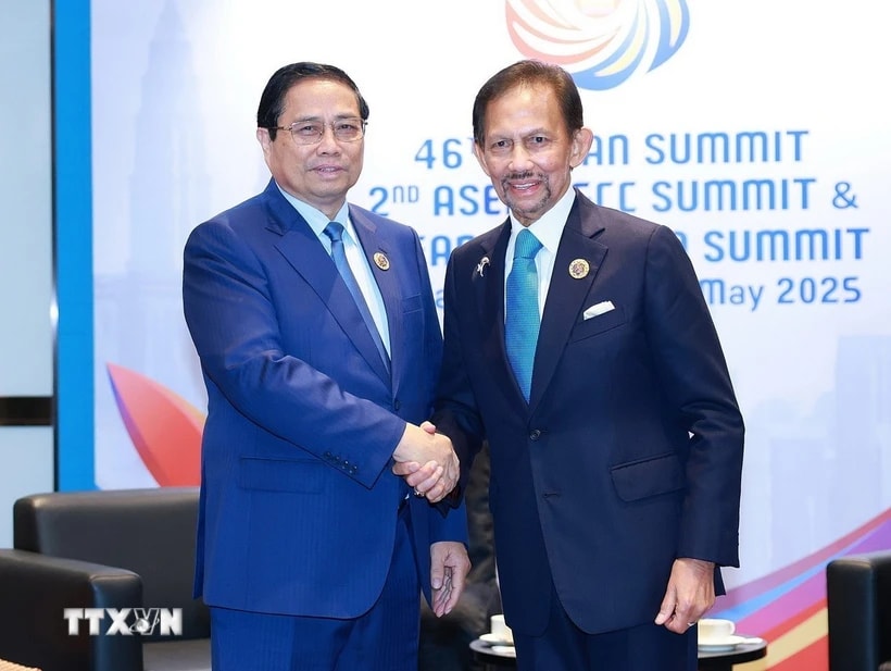 Thủ tướng Phạm Minh Chính gặp Quốc vương Brunei Hassanal Bolkiah. (Ảnh: Dương Giang/TTXVN)
