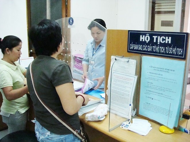 Ủy ban nhân dân xã, phường, đặc khu thực hiện thẩm quyền đăng ký hộ tịch - Ảnh 1.