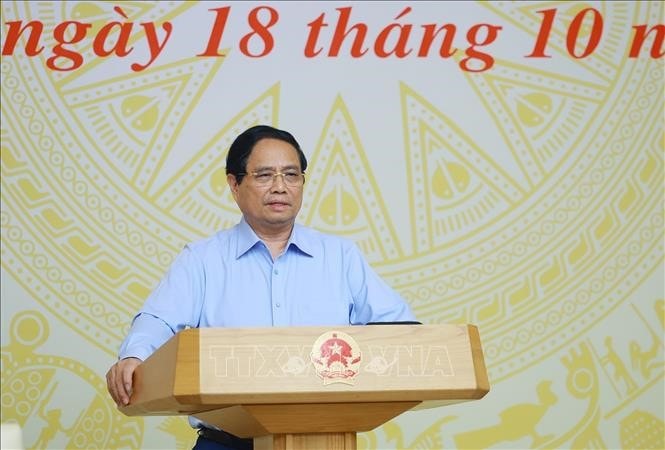 ທ່ານນາຍົກລັດຖະມົນຕີ ຟ້າມບິ່ງມິງ ກ່າວຄຳເຫັນທີ່ກອງປະຊຸມສົ່ງເສີມການລົງທຶນພາກລັດປີ 2025.-anh-ttxvn.jpg