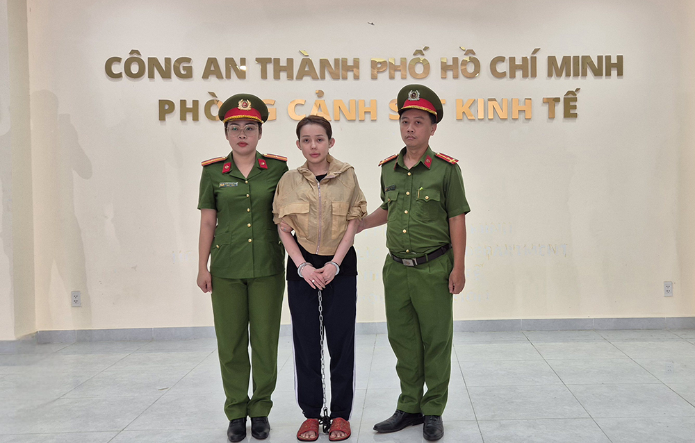 Vo Thi Ngoc Han, DJ Ngan, 98, was arrested for allegedly producing and trading fake food products. Photo provided by the police.png