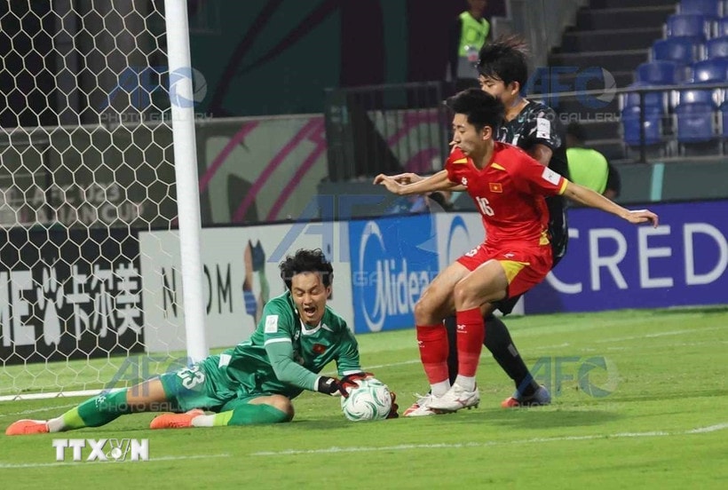 Thủ môn Cao Văn Bình U23 Việt Nam có pha cản phá cứu thua xuất sắc. (Nguồn AFC/TTXVN)