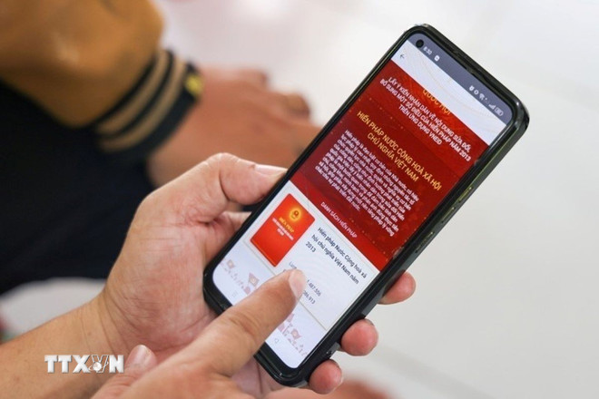 Giao diện màn hình đóng góp ý kiến sửa đổi Hiến pháp trên ứng dụng VneID. (Ảnh: TTXVN phát) ttxvn-vnid.jpg