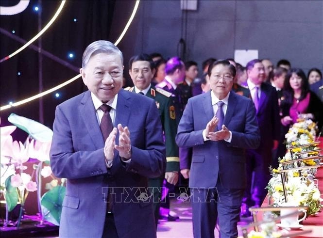 Tổng Bí thư Tô Lâm, Bí thư Quân uỷ Trung ương cùng các đồng chí lãnh đạo và các đại biểu tham dự lễ tổng kết. Ảnh: Thống Nhất/TTXVN