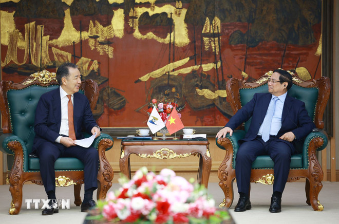 ttxvn-thu-tuong-tiep-chu-tich-hoi-dong-uy-ban-kinh-te-a-au-0203-3.jpg