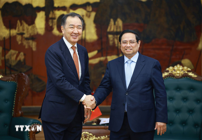 ttxvn-thu-tuong-tiep-chu-tich-hoi-dong-uy-ban-kinh-te-a-au-0203-1.jpg