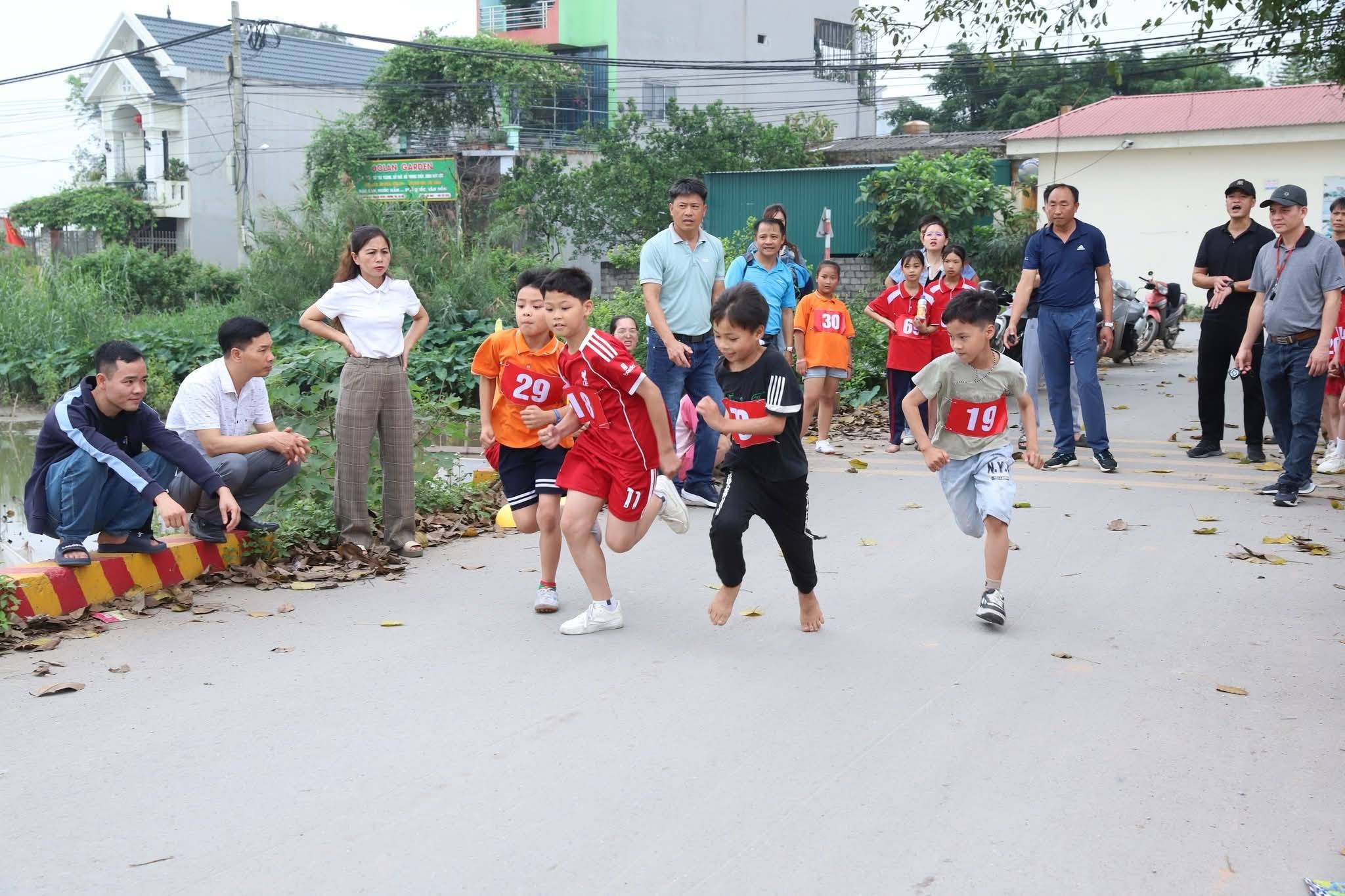 Young athletes competing in the Thuong Phuc sports event.