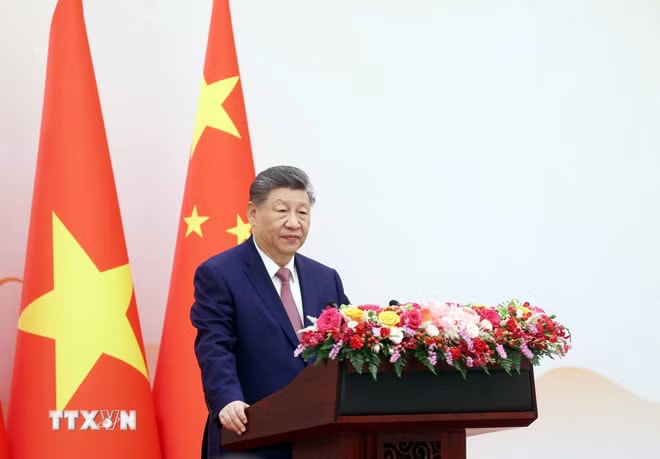 ttxvn-tong-bi-thu-chu-tich-nuoc-to-lam-va-tong-bi-thu-chu-tich-nuoc-tap-can-binh-gap-go-thanh-nien-hai-nuoc-4.jpg