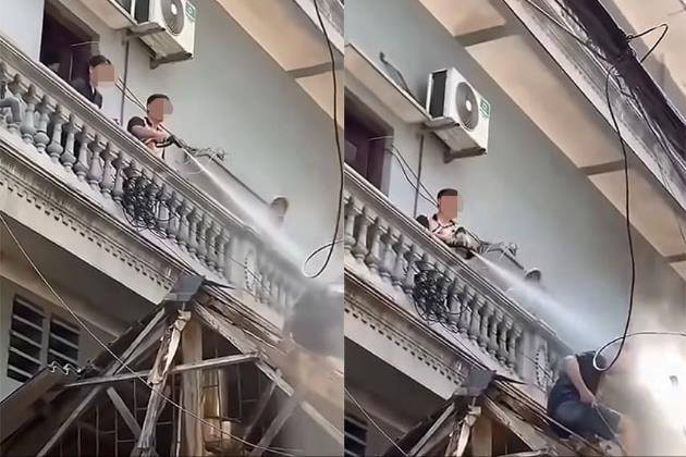 Công an vào cuộc xác minh người đàn ông xịt nước vào thợ đang tháo dỡ công trình