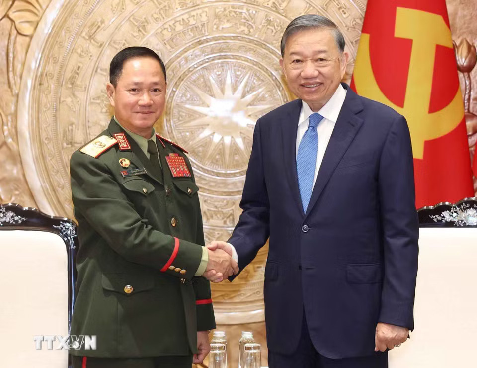 tong-bi-thu-chu-tich-nuoc-tiep-bo-truong-quoc-phong-lao-14.jpg