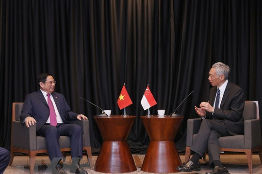 Thủ tướng Phạm Minh Chính gặp Thủ tướng Singapore Lý Hiển Long nhân Hội nghị Cấp cao đặc biệt ASEAN - Hoa Kỳ