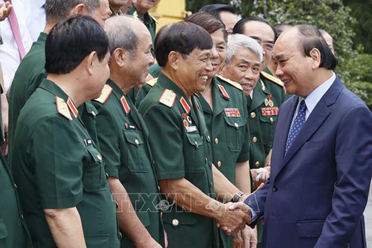 Chủ tịch nước Nguyễn Xuân Phúc tiếp đại biểu cựu chiến binh Mặt trận Vị Xuyên - Hà Tuyên
