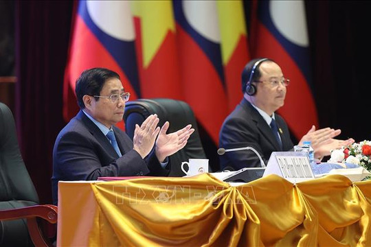 Thủ tướng Chính phủ Phạm Minh Chính và Thủ tướng Lào Sonexay Siphandone chủ trì Hội nghị Hợp tác đầu tư Việt Nam - Lào