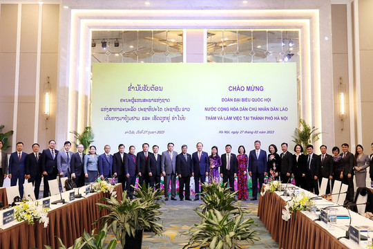 Hà Nội trao đổi kinh nghiệm hoạt động của cơ quan dân cử với Đoàn đại biểu Quốc hội Lào