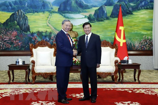 Bộ trưởng Bộ Công an Tô Lâm chào xã giao Tổng Bí thư, Chủ tịch nước Lào Thongloun Sisoulith