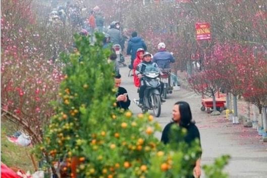 Hà Nội mưa nhỏ, rét trong những ngày Tết Nguyên đán