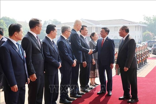 Lễ đón chính thức Thường trực Ban Bí thư Trần Cẩm Tú tại thủ đô Viêng Chăn (Lào)