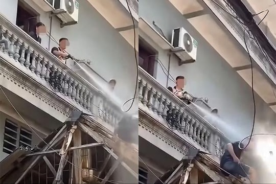 Công an vào cuộc xác minh người đàn ông xịt nước vào thợ đang tháo dỡ công trình