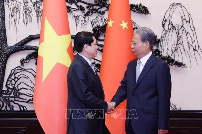 Chủ tịch nước Lương Cường hội kiến Ủy viên trưởng Nhân đại Toàn quốc Trung Quốc Triệu Lạc Tế