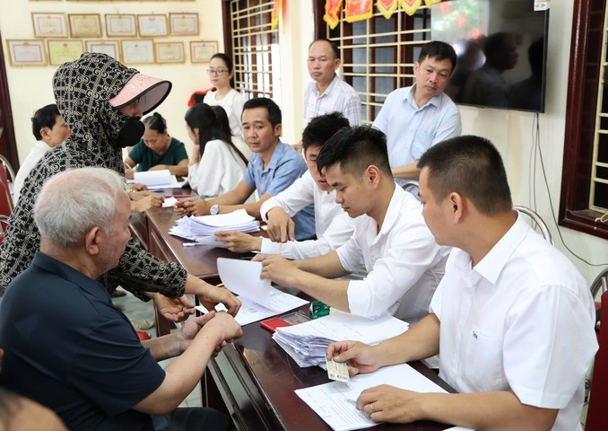 Xã Tam Hưng: Người dân nhận tiền bồi thường, sẵn sàng bàn giao mặt bằng dự án Khu đô thị thể thao Olympic