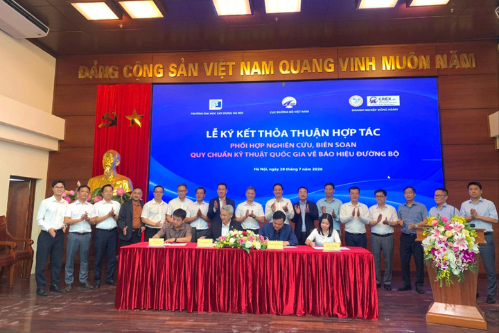 Ký thỏa thuận hợp tác nghiên cứu, sửa đổi Quy chuẩn kỹ thuật Quốc gia về báo hiệu đường bộ